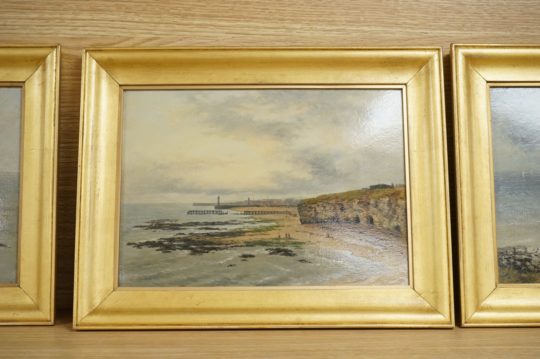 Early 20th century, English school, set of four coastal scenes believed to be Wearside, unsigned, oils on board, 19 x 28cm